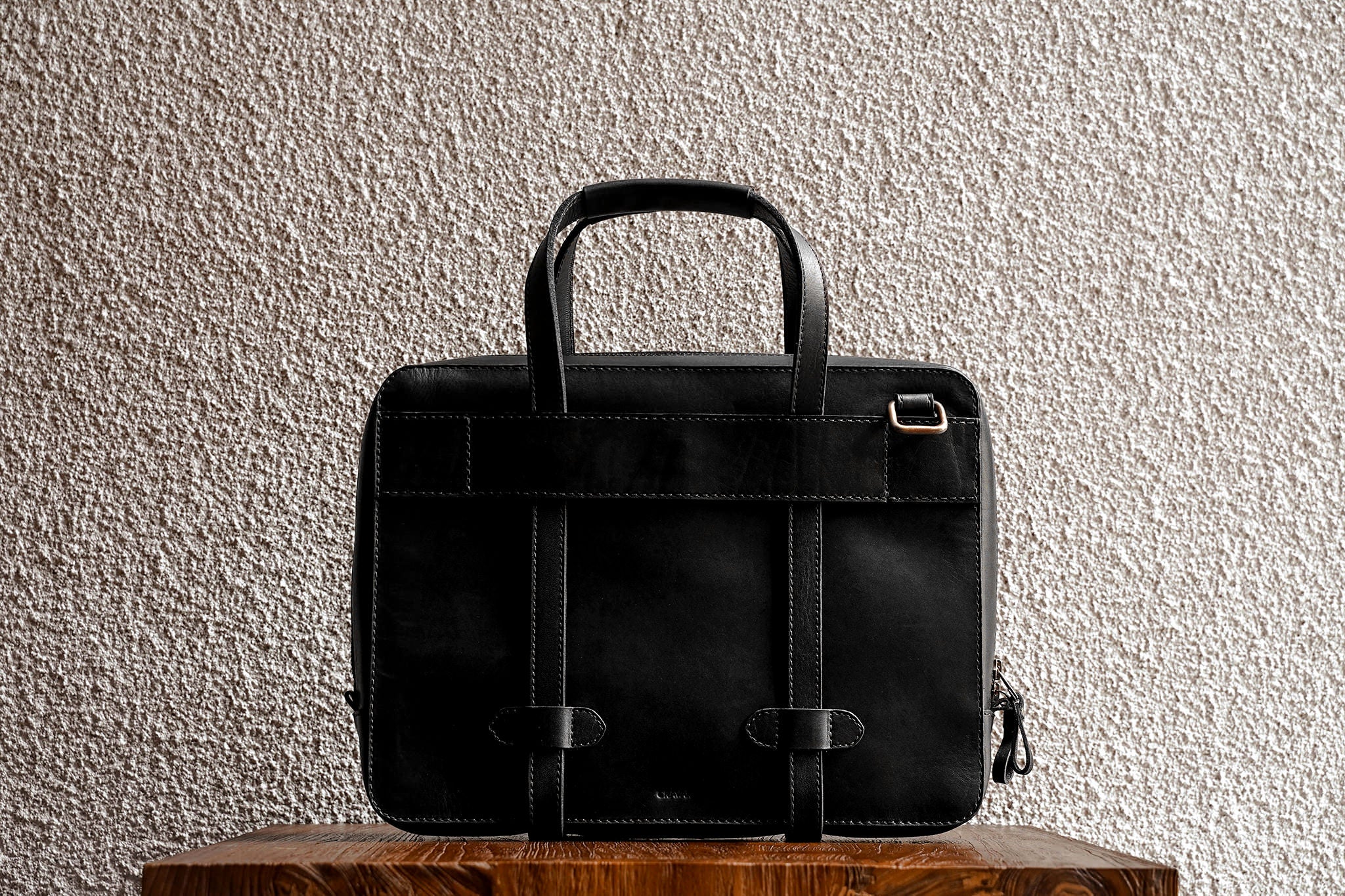 Traveling made easy with the luggage handle slot at the back.
