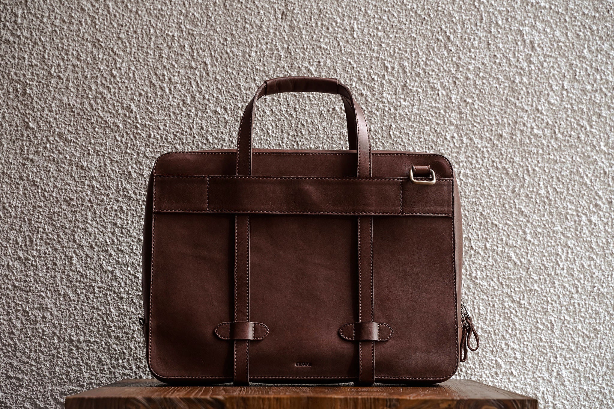 Traveling made easy with the luggage handle slot at the back.