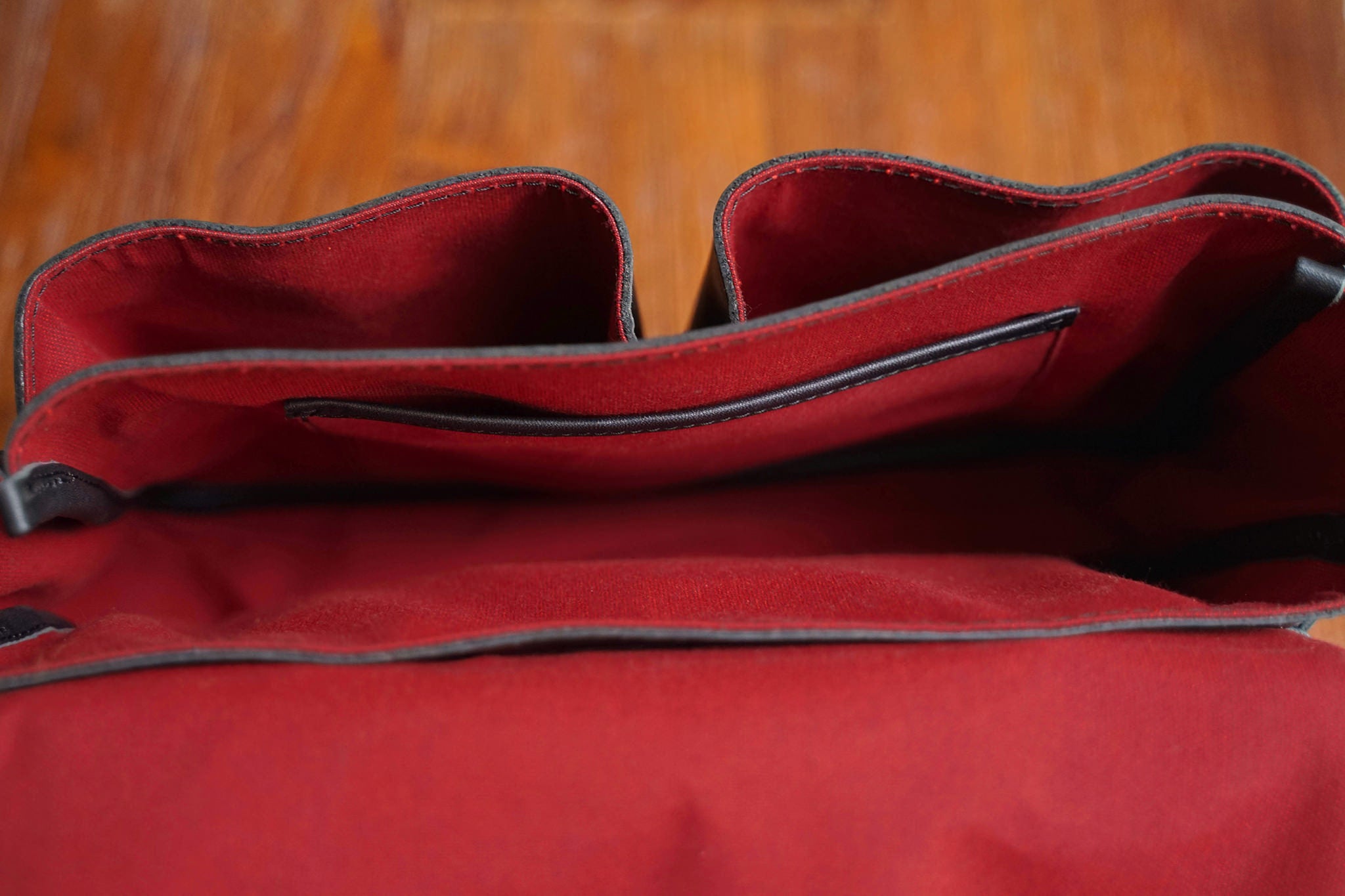 A view of the inside of the F.C. while empty. Note that all inside facing accessories such as rivets are covered, to avoid scratching the bag's contents.