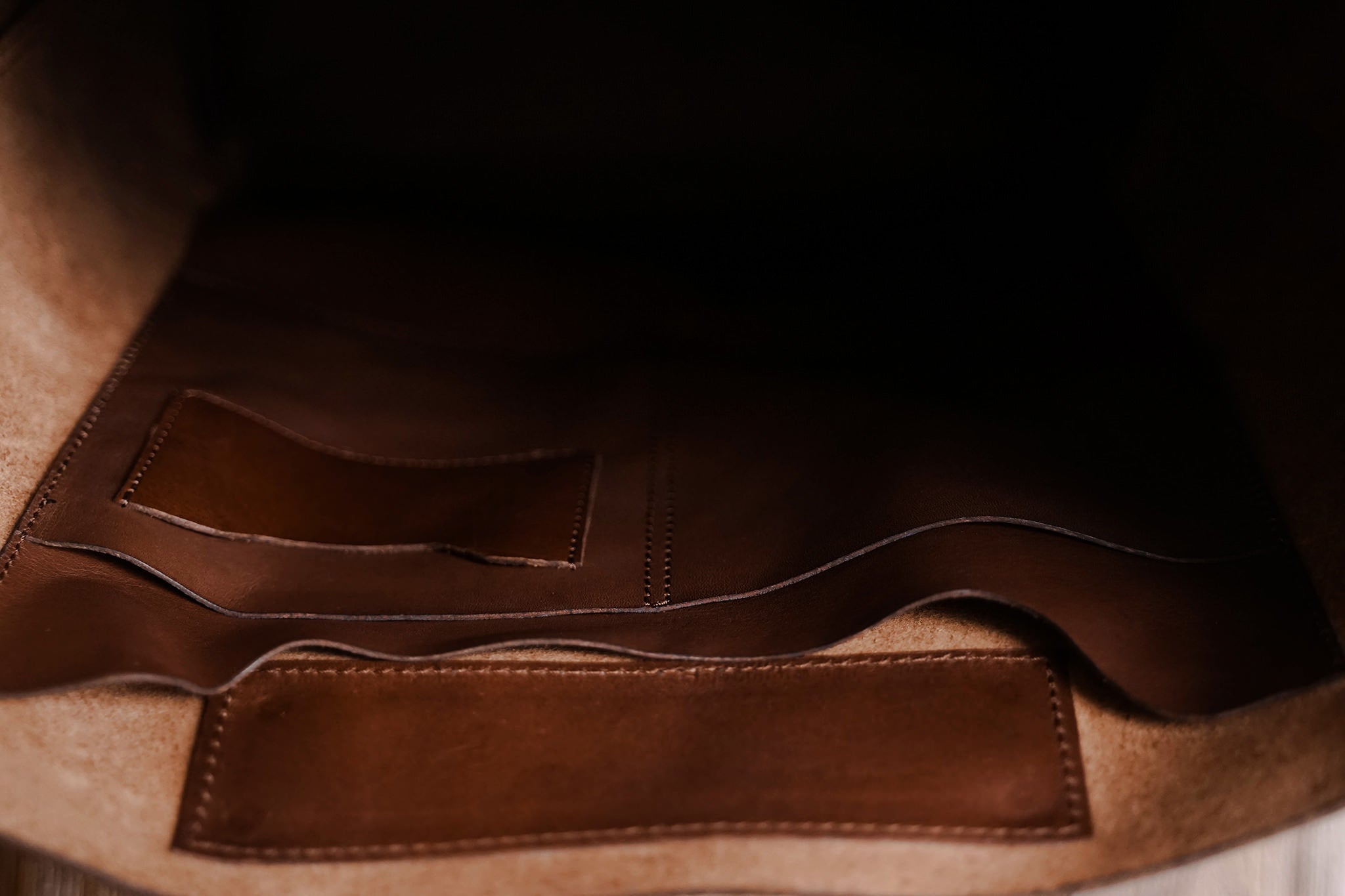 Not a lot of tote bags have laptop slot, ours do, and it fits a 15" laptop, plus two internal pockets. Photo from Fox variant.